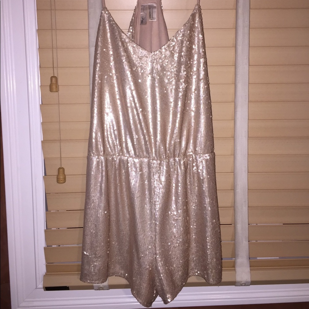 gold sequin romper perfect for a night out